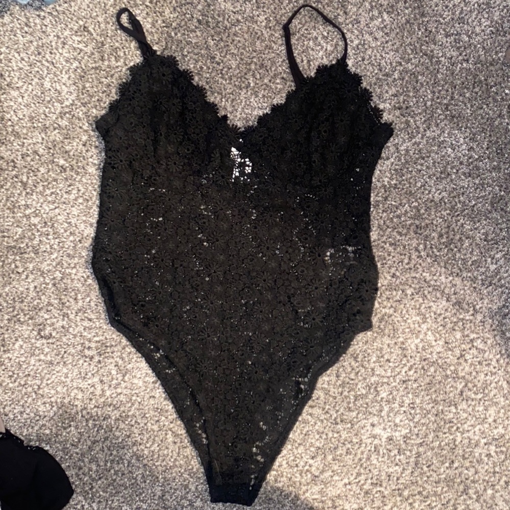 Black crochet body suit from H&M. Medium. Never worn.
